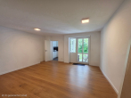 Helle Erdgeschosswohnung im Grünen in Taufkirchen - Wohnzimmer