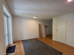 Helle Erdgeschosswohnung im Grünen in Taufkirchen - Wohn-Schlafzimmer