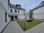 Sorgenfrei und ruhig: In barrierefreier Wohnung im NEUBAUSTANDARD wohnen... - Innenhof mit Hauseingang